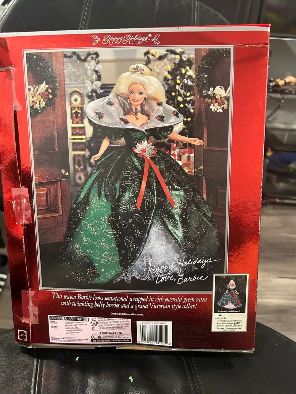 1995 Special Edition Happy Holidays Barbie by Mattel, featuring a distinct emera